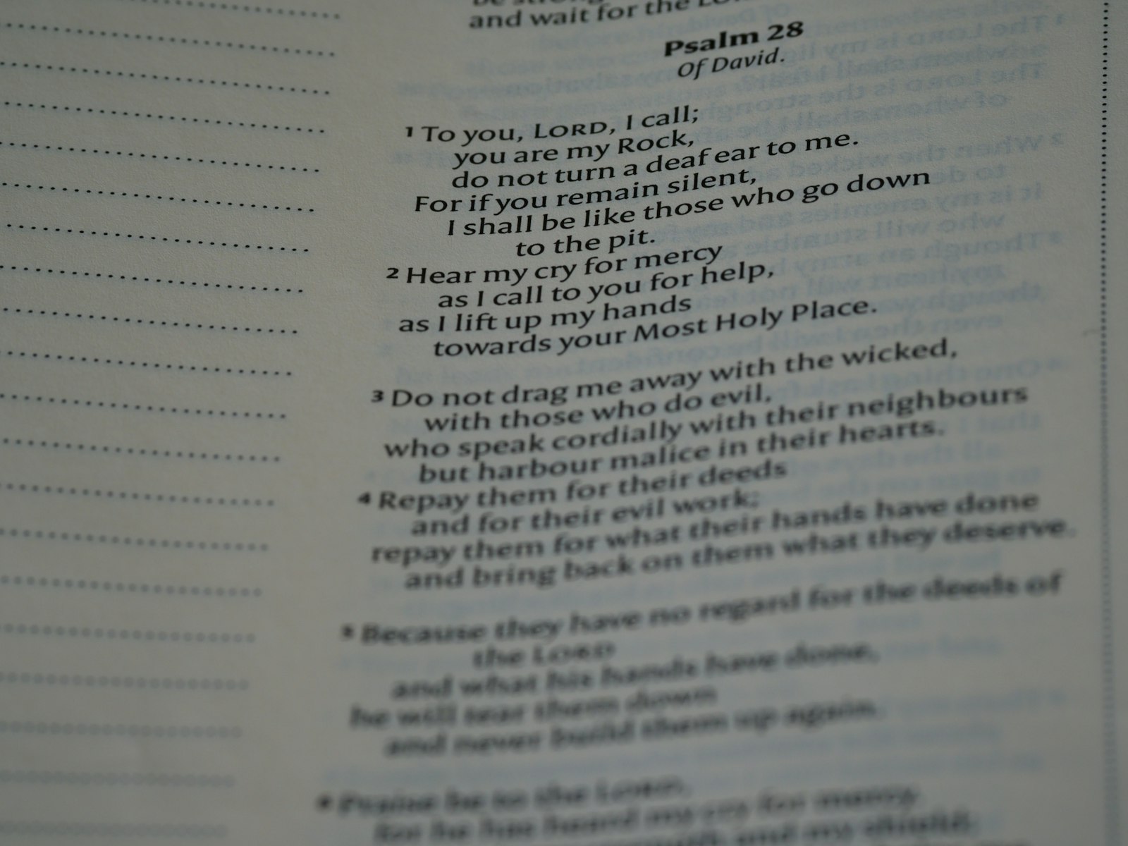 a close up of a book with a poem on it